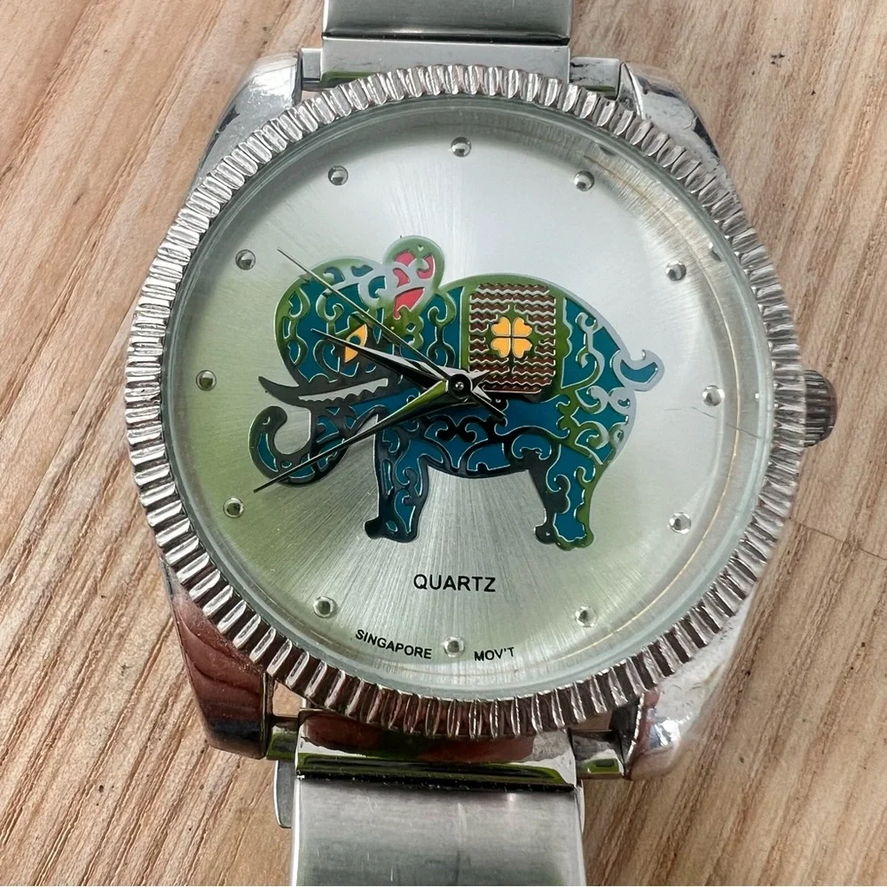Unbranded ladies silver tone elephant fashion watch NEW BATTERY